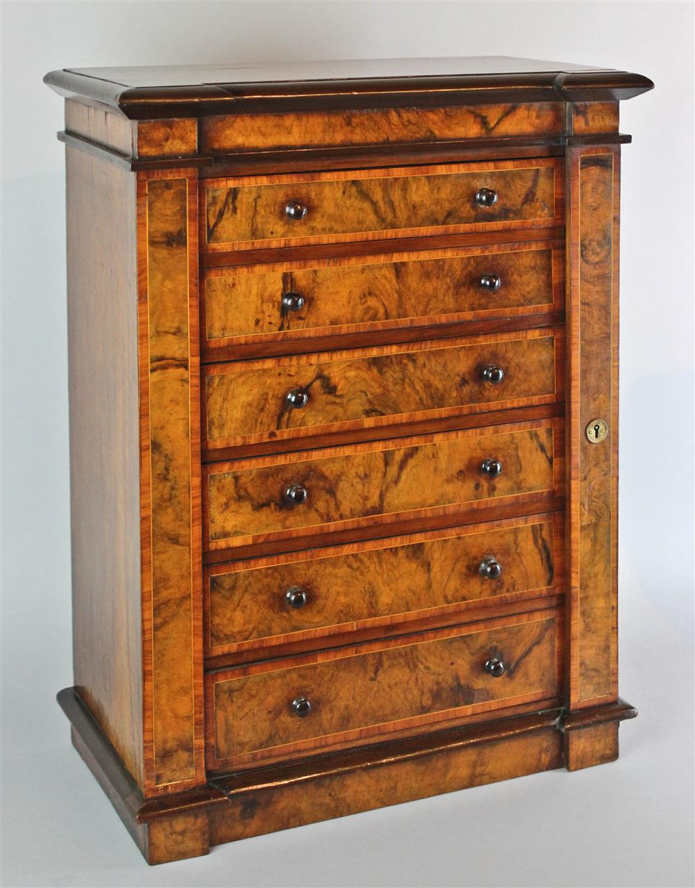 Appraisal: MINIATURE FIGURED AND INLAID WALNUT NORTHUMBERLAND CABINET TABLE TOP LINGERIE