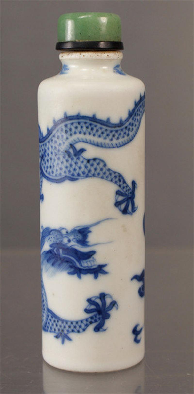 Appraisal: Cylindrical porcelain snuff bottle with blue underglaze dragon seeking flaming