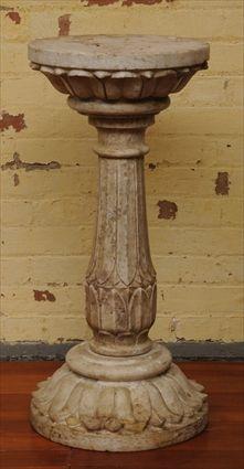 Appraisal: VICTORIAN CARVED ALABASTER PEDESTAL The round top over leaf-carved baluster-form