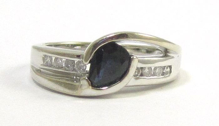 Appraisal: SAPPHIRE DIAMOND AND FOURTEEN KARAT WHITE GOLD RING having a