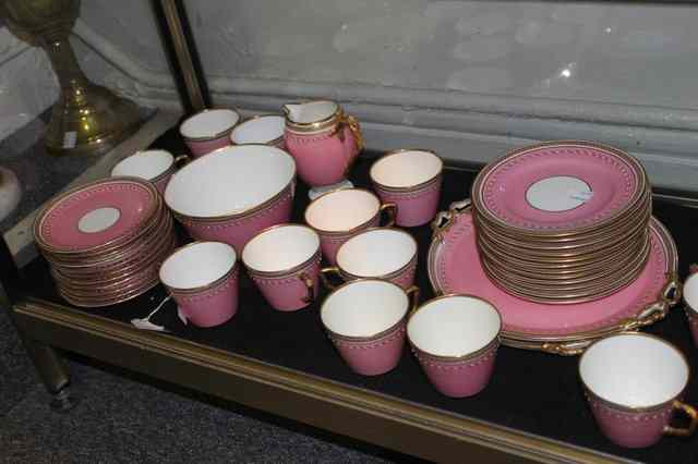 Appraisal: A MINTON PORCELAIN TEA SET of pink ground with Greek