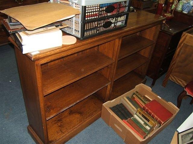 Appraisal: A late th Century solid oak open front bookcase with