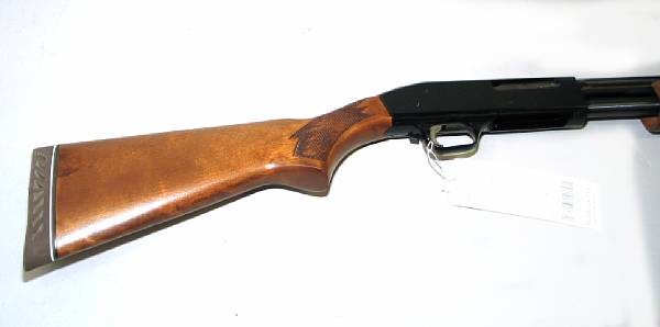 Appraisal: A gauge Mossberg Model E slide action shotgun Serial no