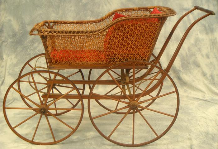 Appraisal: Victorian wicker baby carriage spider web caned design Estimate -