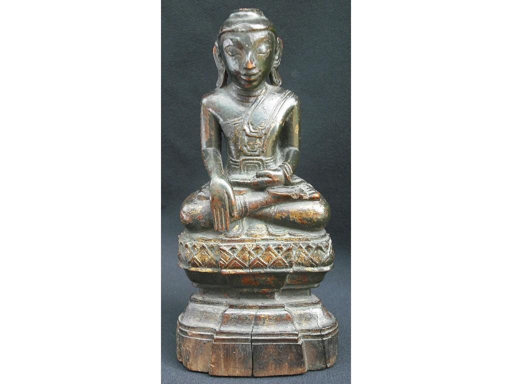 Appraisal: Interesting Oriental carved wooden antique seated Buddha figure upon a