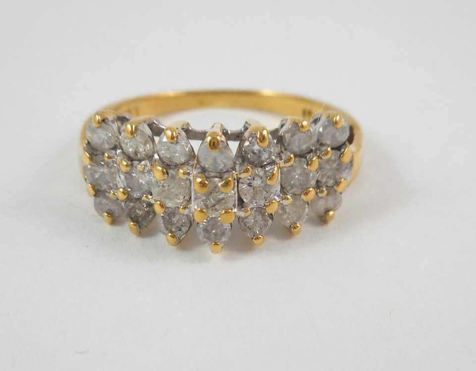 Appraisal: DIAMOND AND TEN KARAT YELLOW GOLD RING set with round-cut