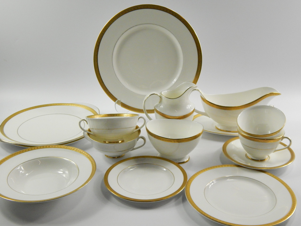 Appraisal: A Royal Doulton porcelain part dinner and tea service decorated