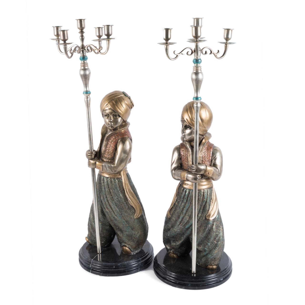 Appraisal: PAIR OF ORIENTALIST COLD PAINTED TORCH BEARERS Pair of Orientalist