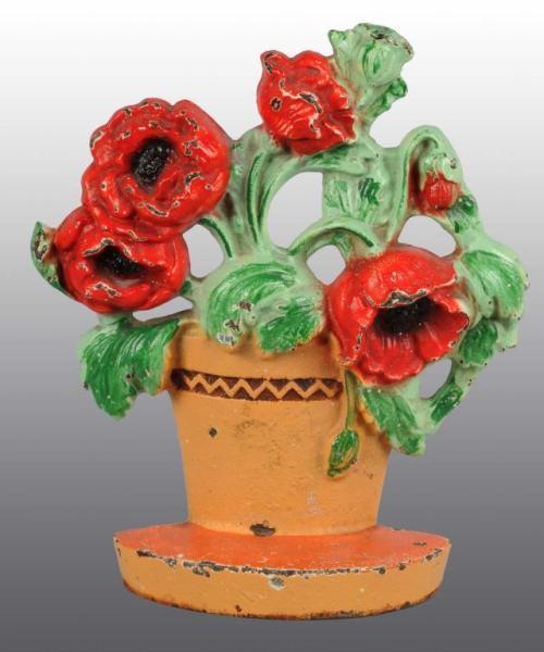 Appraisal: Cast Iron Poppies in Clay Pot Doorstop Description Made by