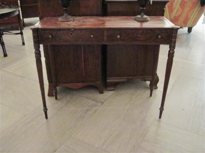 Appraisal: Sheraton style mahogany side table st half of The th