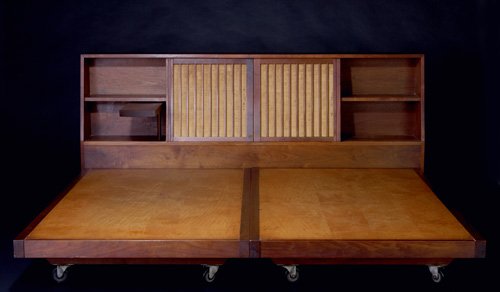 Appraisal: GEORGE NAKASHIMA King-size walnut Storage Headboard with grass-cloth doors enclosing