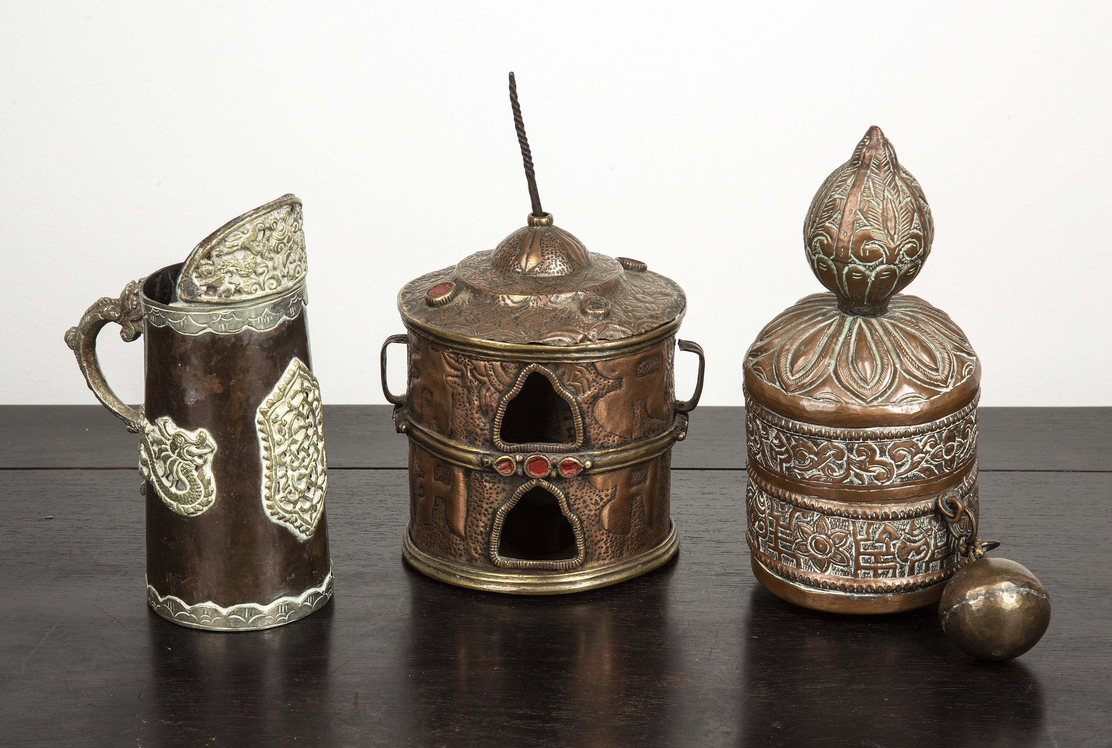 Appraisal: Two prayer wheelsTibetan and a Tibetan monk's drinking vessel cm