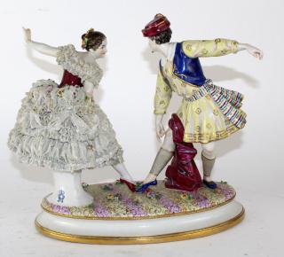 Appraisal: German porcelain grouping of man and woman dancing h x