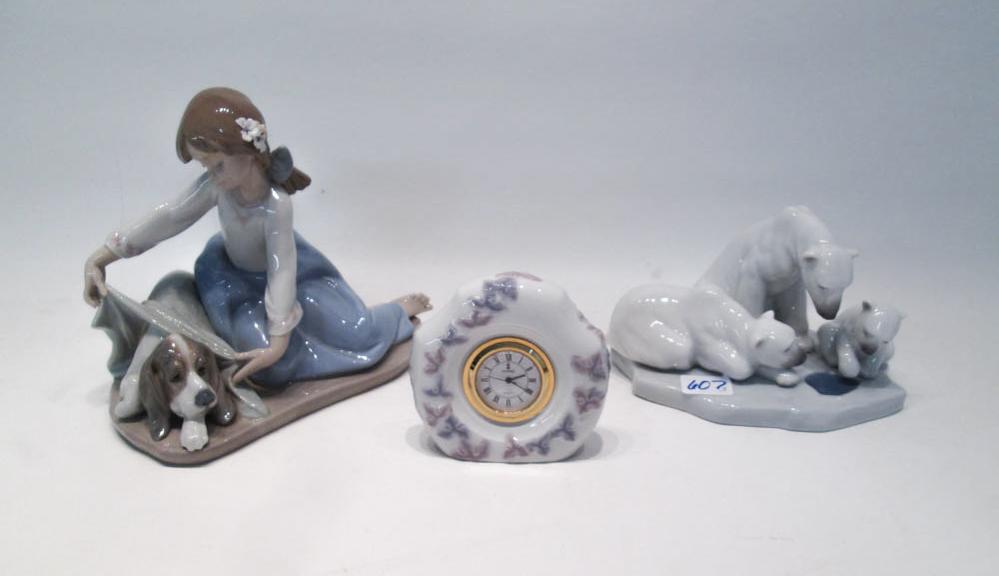 Appraisal: THREE LLADRO PORCELAINS two figurines Dog's Best Friend sculptor Antonio