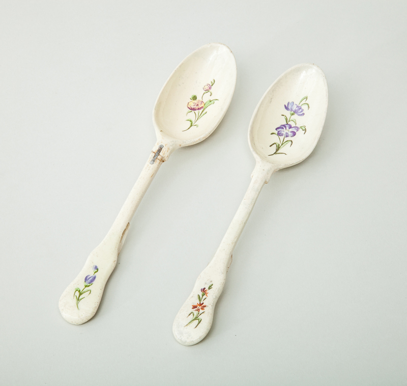 Appraisal: PAIR OF WEDGWOOD POTTERY TABLE SPOONS Impressed mark one staple-repaired