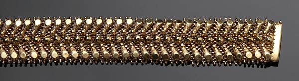 Appraisal: An eighteen karat yellow gold fancy link bracelet Length in