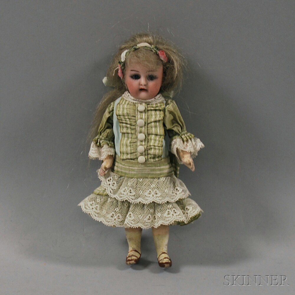 Appraisal: Tiny K R Bisque Head Girl Doll early th century