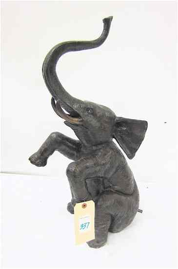 Appraisal: FIGURAL BRONZE FOUNTAIN SCULPTURE the seated figure of an elephant