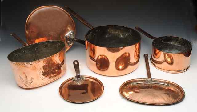 Appraisal: A COPPER SAUCEPAN with lid and iron handle diameter a