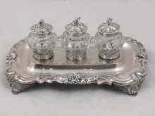 Appraisal: A William IV silver three bottle ink stand hallmarked for