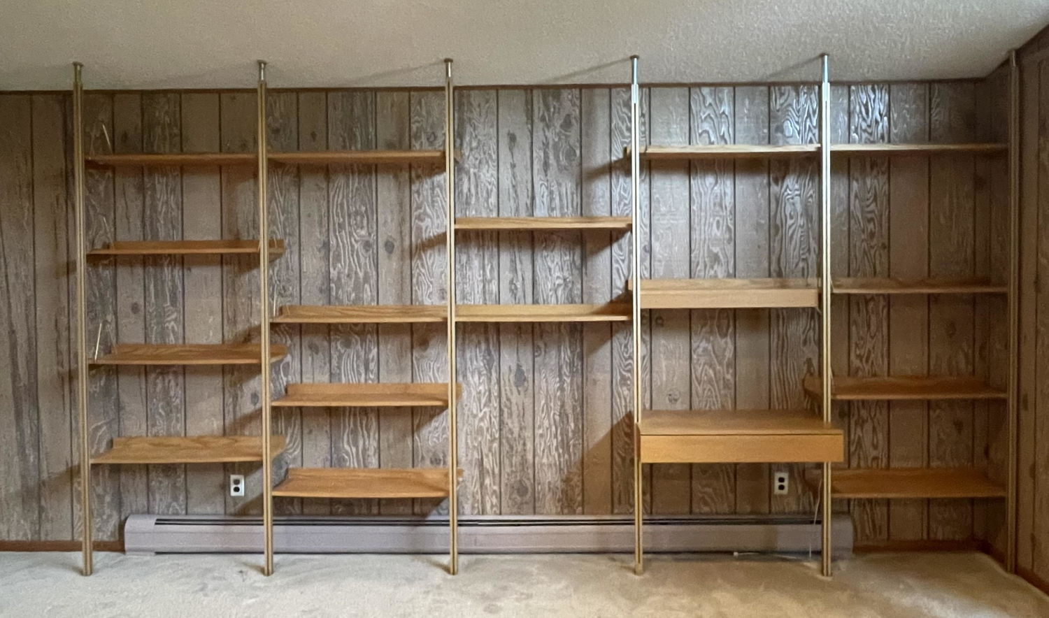 Appraisal: Oak Modernist Wall Shelf Unit Six uprights Eleven Shelves with