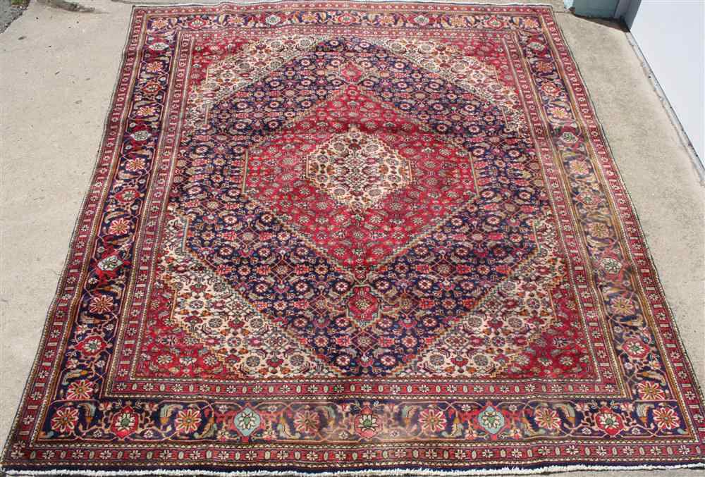 Appraisal: PERSIAN KASHAN RUG with central medallion surrounded by numerous borders