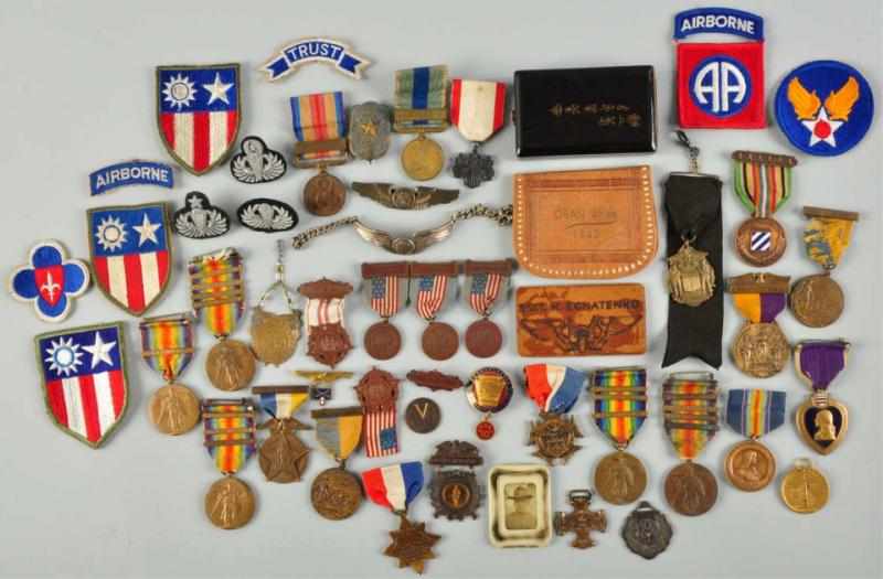 Appraisal: Lot of US Military Medals Pins Patches Consists of over