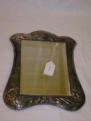 Appraisal: AN ART NOUVEAU STYLE EASEL BACK MIRROR the vertical rectangular