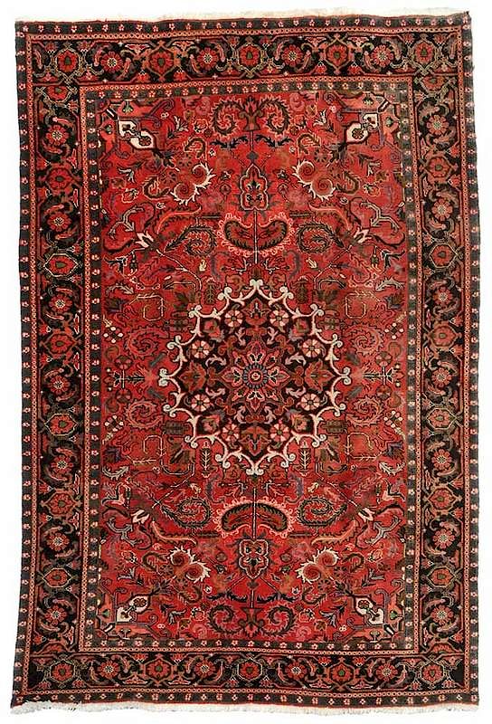 Appraisal: Heriz Carpet Persian th century red ground with green blue