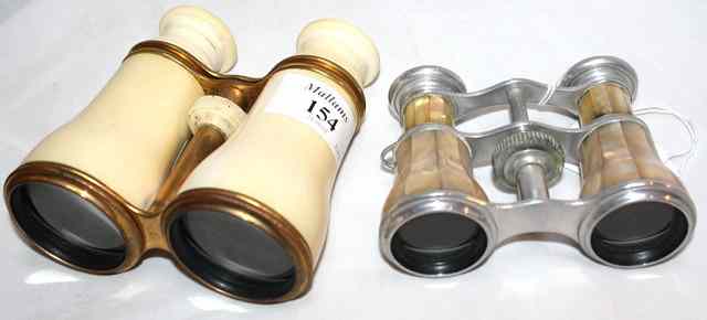 Appraisal: A PAIR OF IVORY AND GILT METAL OPERA GLASSES long