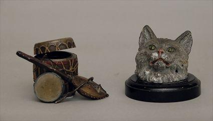 Appraisal: Cat-Form Paper Weight together with a Barrel-Form Inkstand