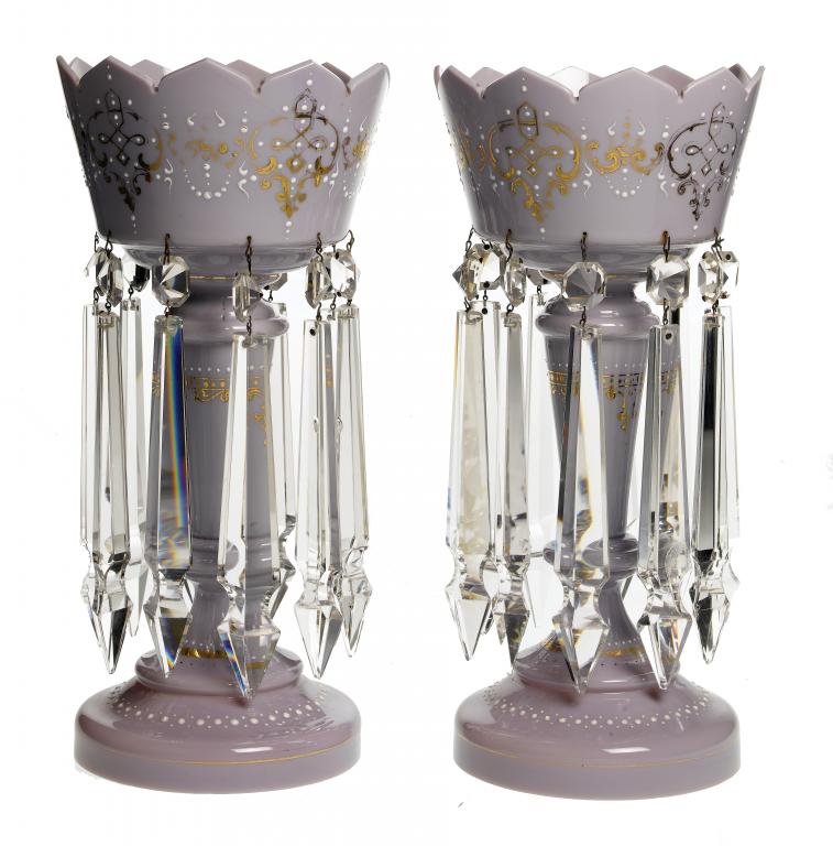 Appraisal: A PAIR OF VICTORIAN LAVENDER GLASS LUSTRES with white enamel