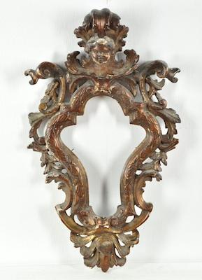 Appraisal: A Vintage Cartouche Picture Frame With carved curvilinear foliate elements