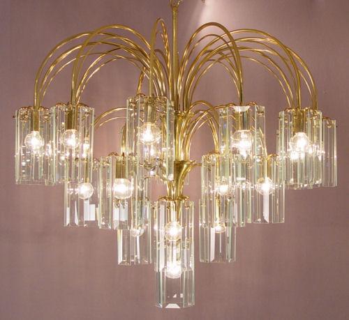 Appraisal: ELEGANT CONTEMPORARY BRASS GLASS CHANDELIER Each of the lights surrounded