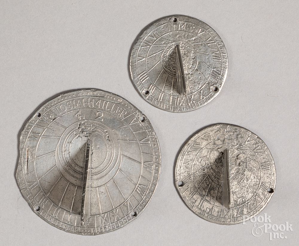 Appraisal: Three pewter sundials Three pewter sundials the largest marked by