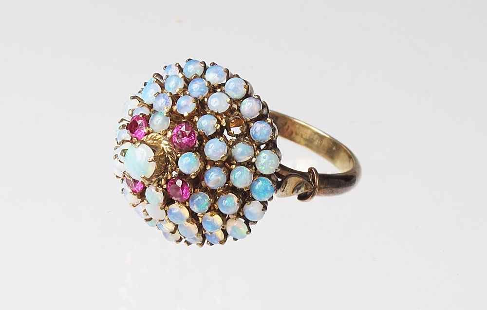 Appraisal: OPAL PRINCESS RING K yellow gold ring contains round cabochon