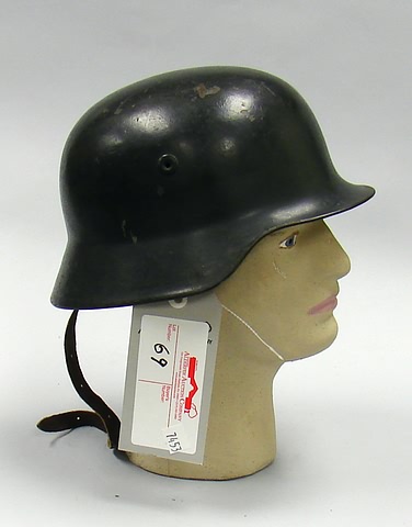 Appraisal: Lot consists of a post war German steel helmet complete