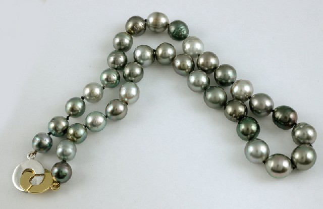 Appraisal: A SEMI BAROQUE TAHITIAN PEARL NECKLACE Comprising thirty four semi