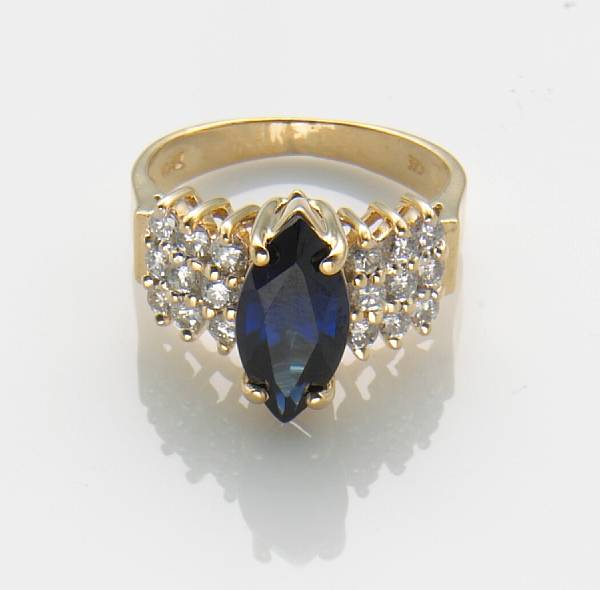 Appraisal: A synthetic sapphire diamond and k gold ring