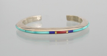 Appraisal: A Sterling Silver Cuff Bracelet with Turquoise Inlay by Jimmie