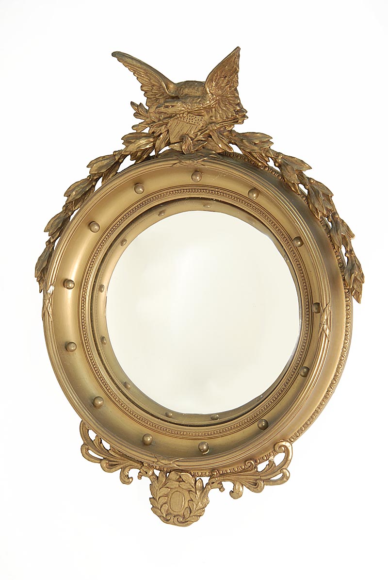 Appraisal: TH CENTURY AMERICAN CONVEX MIRROR with gilt eagle shields and