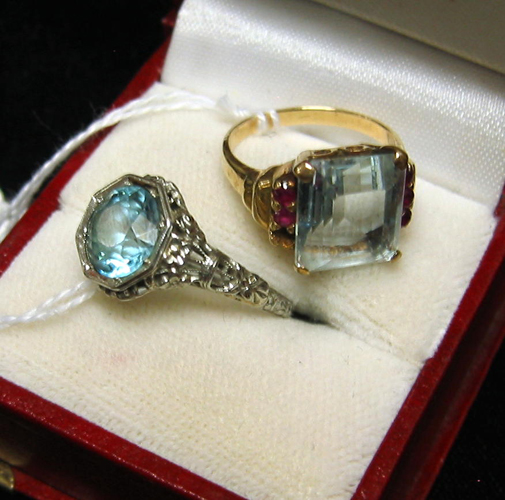 Appraisal: TWO BLUE GEMSTONE AND GOLD RING One a round-cut zircon