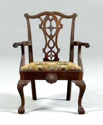 Appraisal: Philadelphia Chippendale style armchair finely carved mahogany throughout with needlepoint