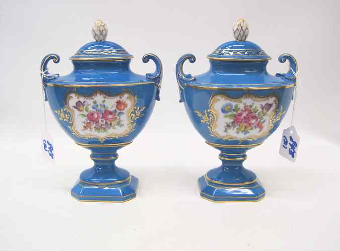 Appraisal: PAIR FRENCH ''SEVRES'' PORCELAIN COVERED PEDESTAL JARS each with gold