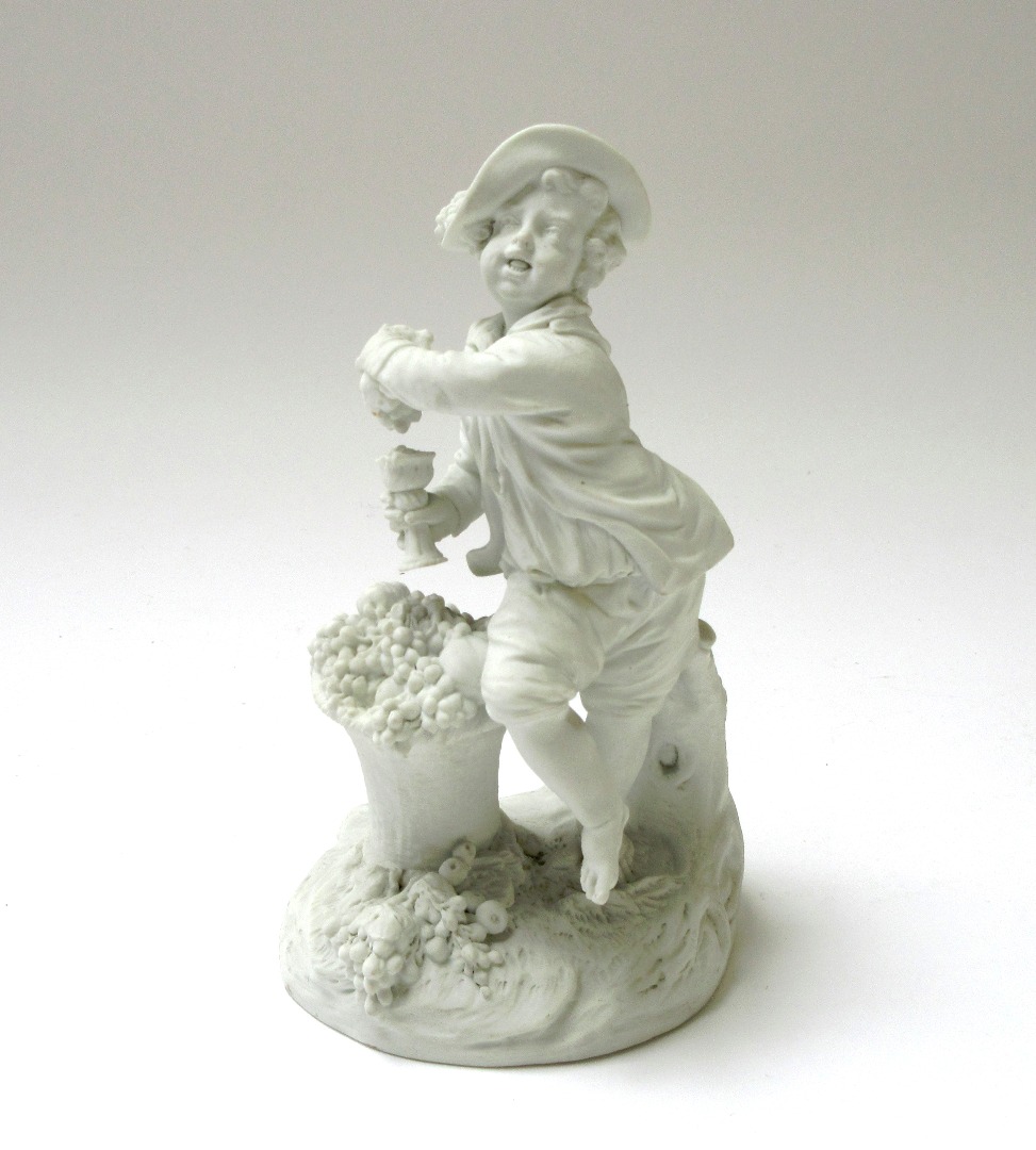 Appraisal: A French biscuit figure of a youth late th century