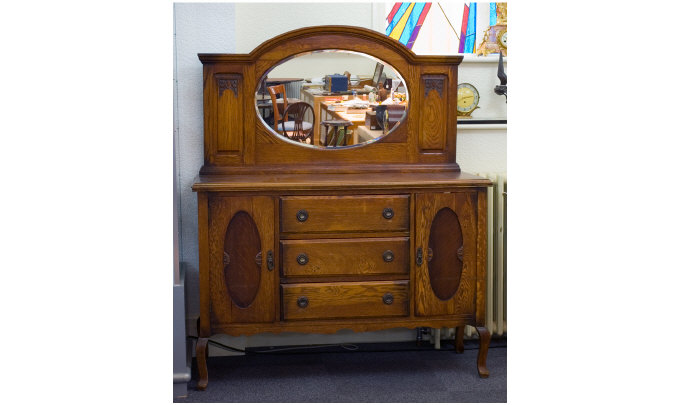 Appraisal: Oak Art Nouveau Sideboard With Mirror Back Carved Motifs Central