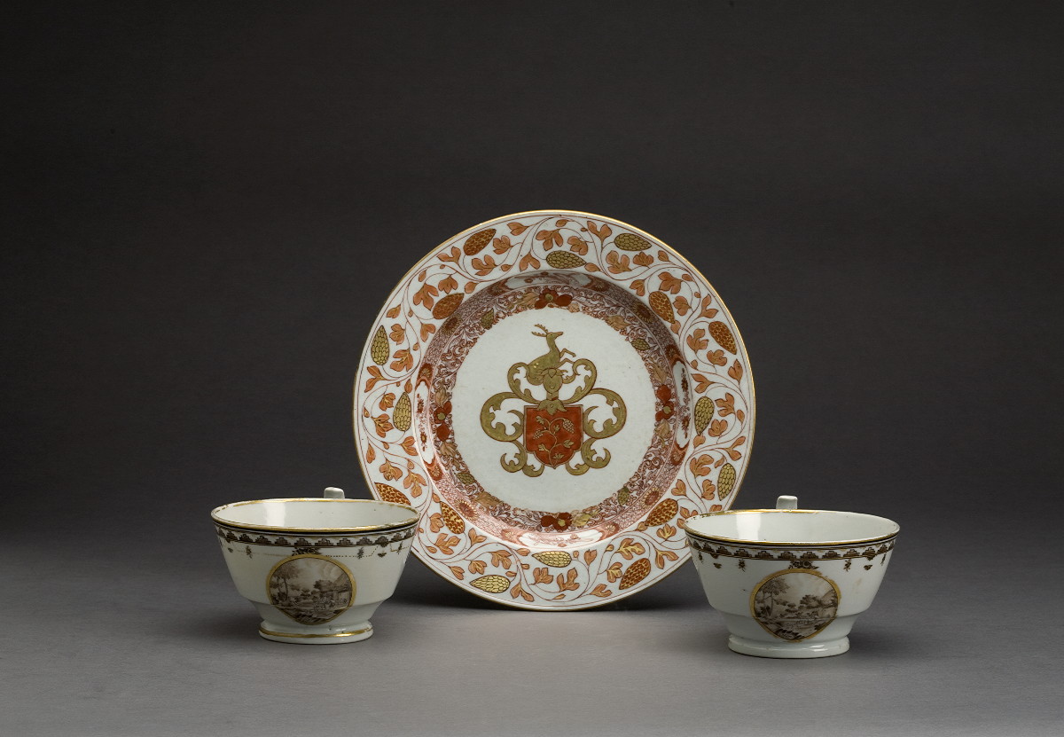 Appraisal: PAIR OF CHINESE EXPORT PORCELAIN ARMORIAL CUPS CIRCA Each painted