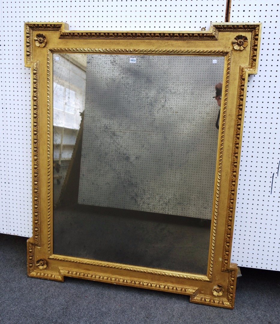 Appraisal: A th century gilt framed rectangular wall mirror with outstepped