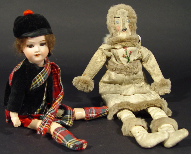 Appraisal: German bisque headed child's doll in highland costume stamped KH