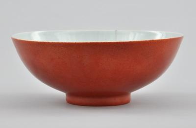 Appraisal: Chinese Bowl Porcelain bowl with reddish orange glaze with a